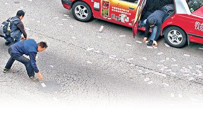 香港运钞车掉3000万现钞一半被捡走 3人已定罪